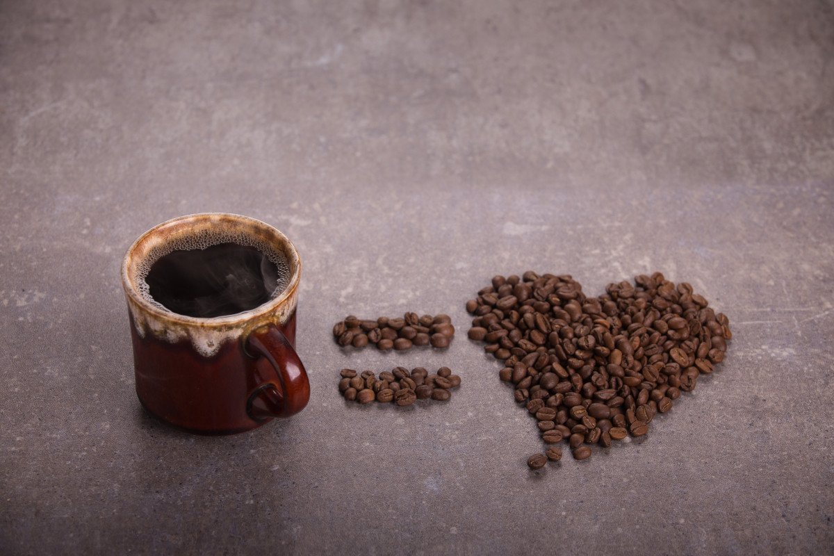 Coffee Cup and Coffee Beans in the Shape of Heart